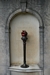 Memorial inscription and metal torch