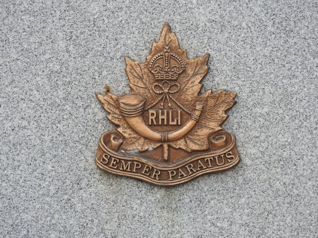 World War II RHLI capbadge reproduced on monument